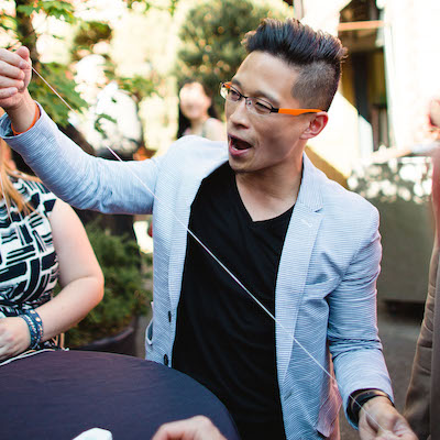 magician holding floss